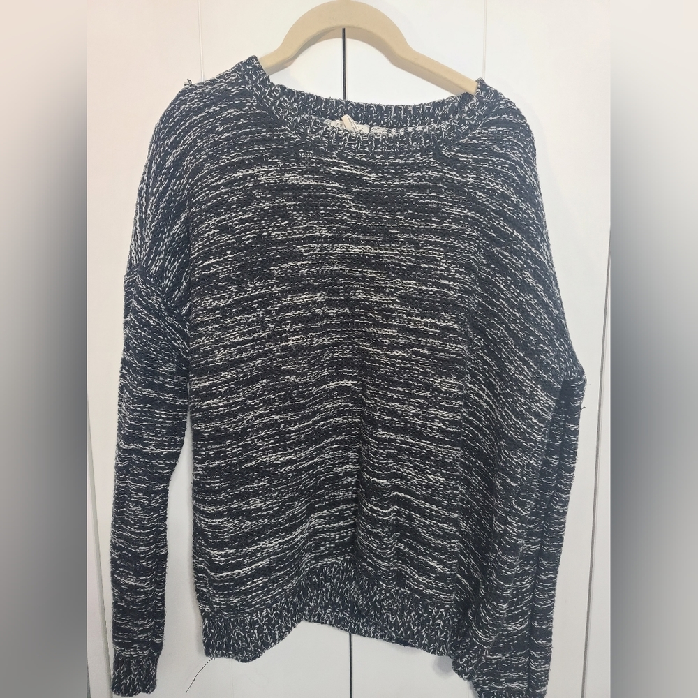 Black and white sweater size large